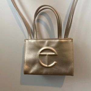 Authentic small gold telfar bag used